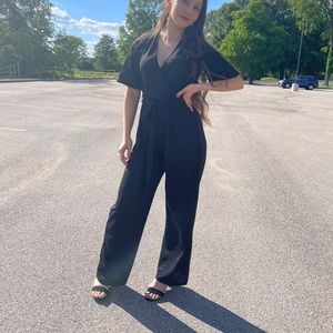 Black shiny jumpsuit from Francesca’s’s